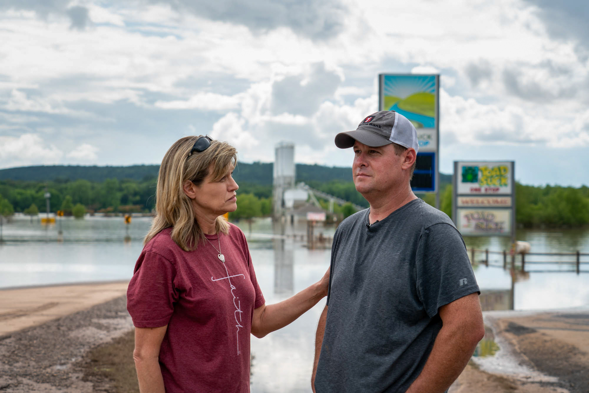 Jason and Christy Trantina - Jason and Christy Trantina own and operate the Toad Suck One-Stop, the only store in Toad Suck, Arkansas, population 288. Jason and his employees tried to hold back the flood waters from the Arkansas River with a barrier of concrete blocks, like the Trantinas have done before. “But this flood was different,” Christy said. “It was river-rushing current water, and so the current washed away some of the barrier and water got inside and it was able to get inside our store.” (Jordan Laird/News21)