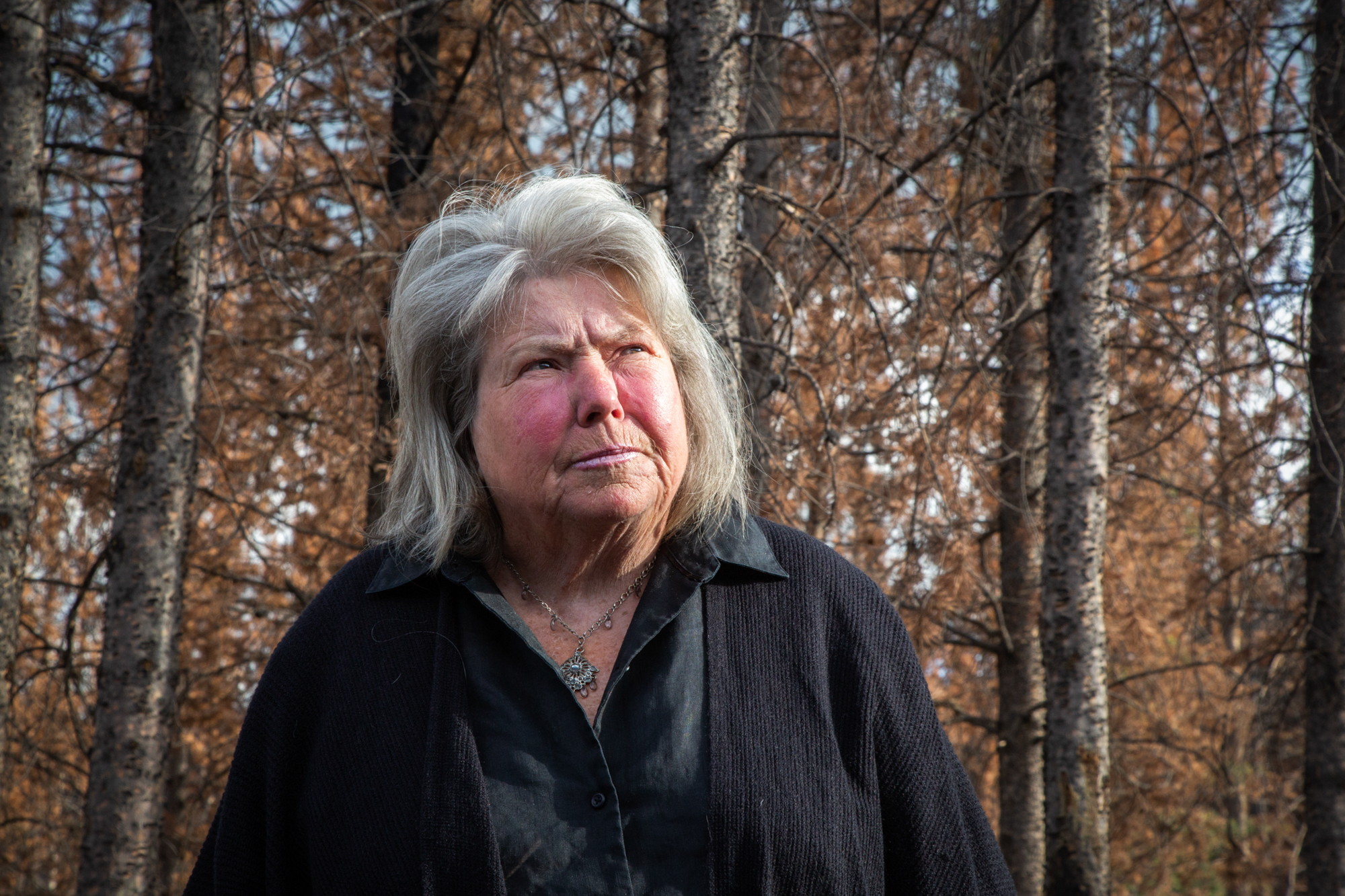 Marlene “Lanie” Beebe - Marlene “Lanie” Beebe, who lives in Hoback Ranches, Wyoming, lost her home and a shed in the 2018 Roosevelt Fire. Beebe lived out of her truck until a neighbor bought her a trailer to place on her property. Beebe is a potter and artist, and the fire destroyed her journals and art collections. (Drew Hutchinson/News21)