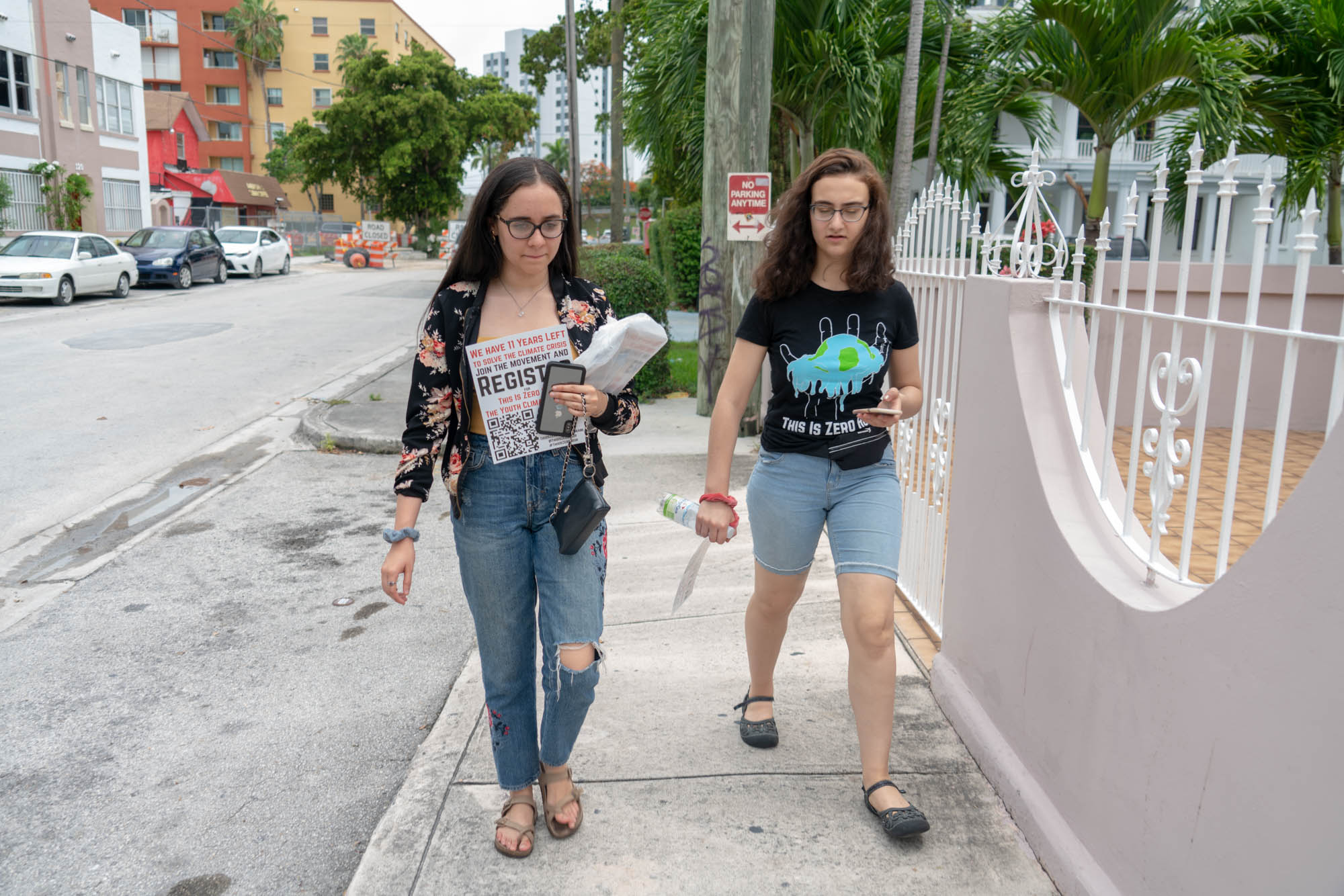 Sohayla Eldeeb (left) and Jamie Margolin of the activist group Zero Hour hung posters and distributed flyers around Miami to drum up interest in the Youth Climate Summit in July.
(Jordan Laird/News21)