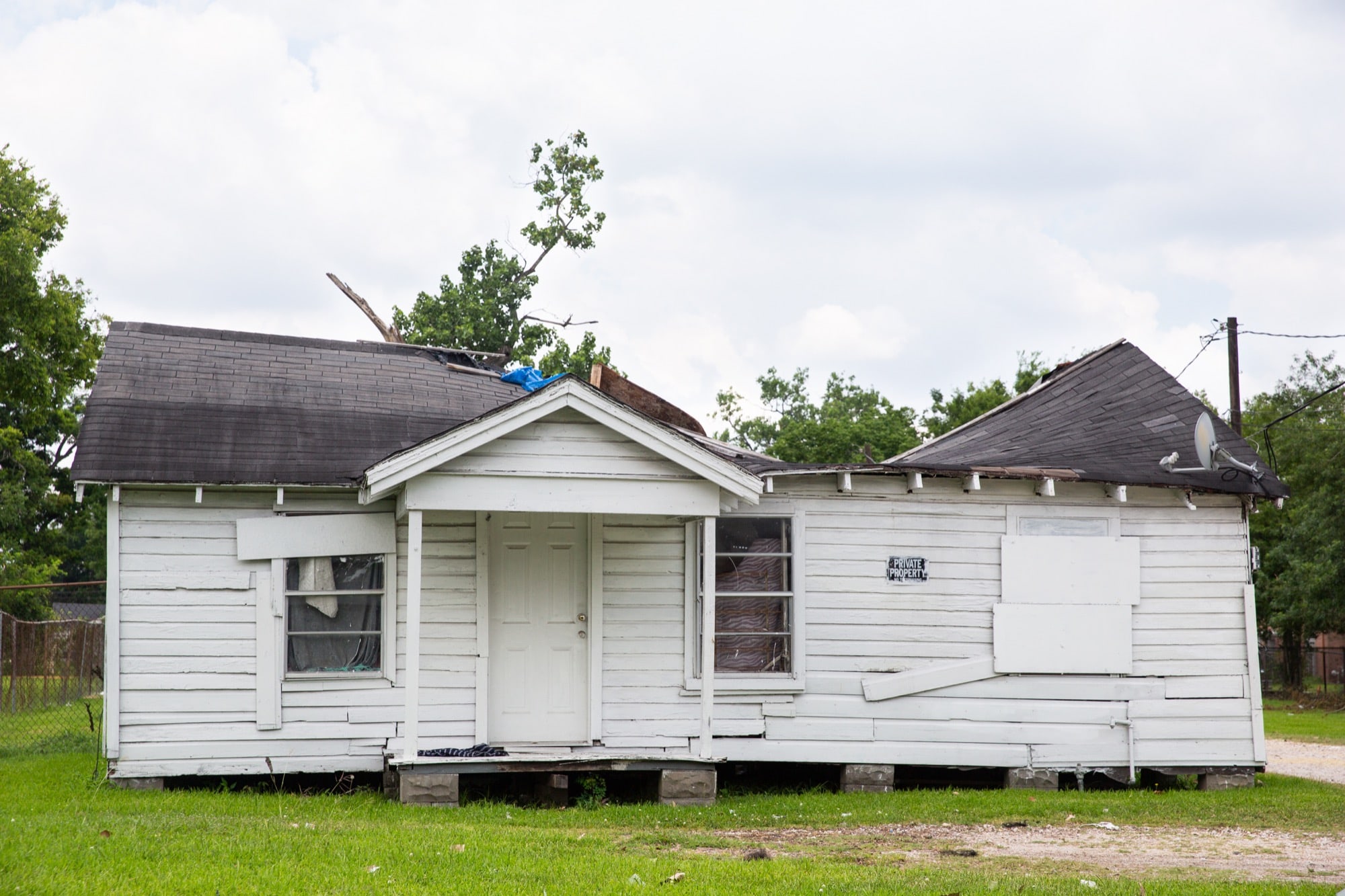 Much of Kashmere Gardens, a historically black and low-income neighborhood in Houston, looks like Hurricane Harvey struck just a few weeks ago rather than two years. Colleen Henneke, a volunteer with the nonprofit Houston Responds, said team members are still encountering people living in nearly destroyed and mold-infested homes.  (Stacy Fernández/News21)