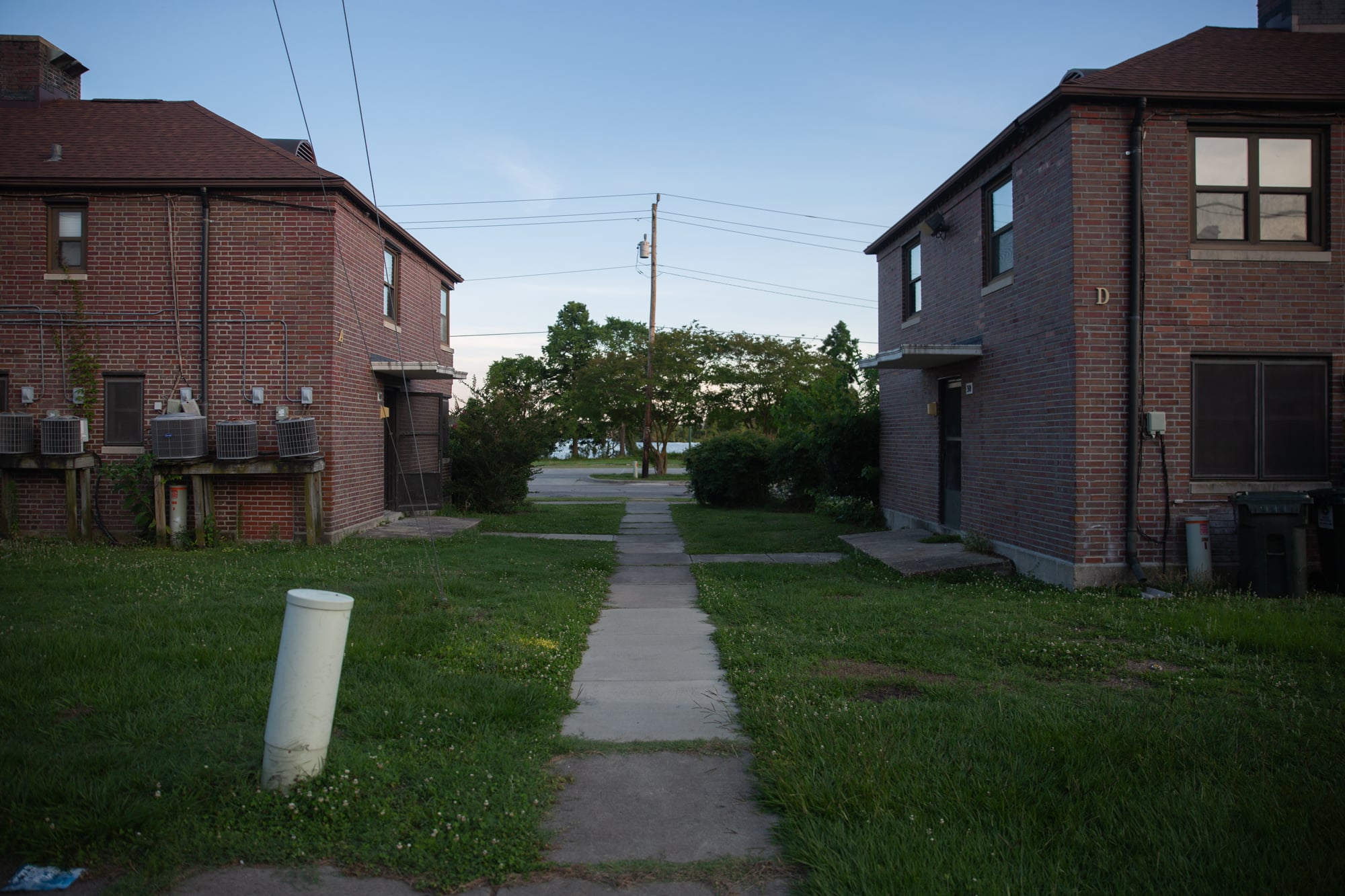 Trent Court, a low-income housing project in New Bern, North Carolina, was swamped when the Trent River overflowed its banks in 2018. Half of the 200 or so apartments are abandoned and scheduled for demolition. (Harrison Mantas/ News21)