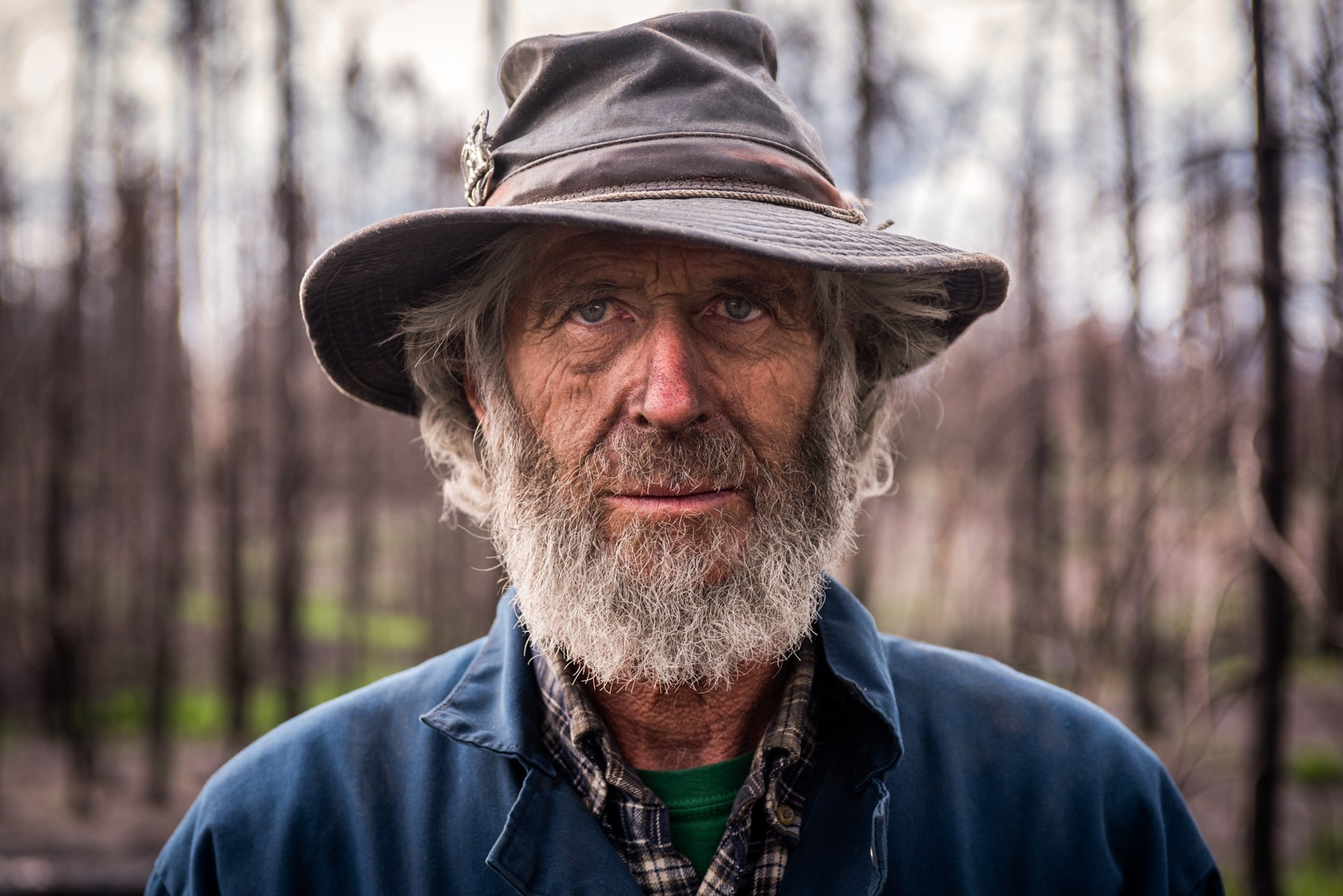 Bruce Cameron - Bruce Cameron lost his house and several vehicles to the 2018 Roosevelt Fire in Hoback Ranches, Wyoming. After the fire, Cameron suffered two brain aneurysms, and he now is working to clean up what used to be his home. (Dustin Patar/News21)