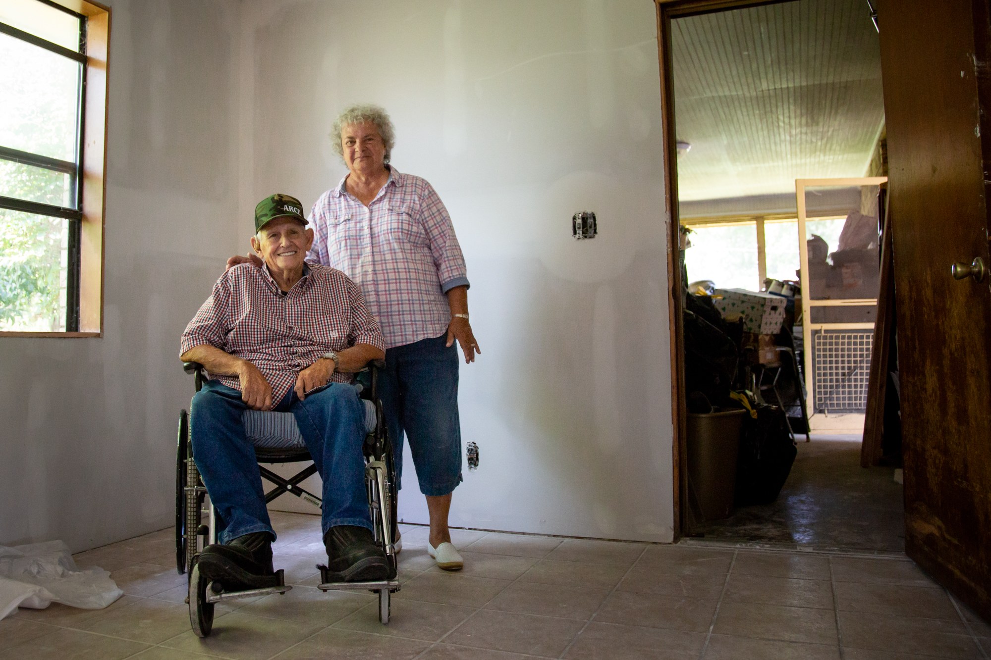 Ron and Ruth Burris - After floodwaters from the Arkansas River flooded Ron and Ruth Burris’ home in Sand Springs, Oklahoma, they didn’t know where to begin the recovery process until Team Rubicon, a nonprofit that deploys rapid response teams to disaster areas, came by to help them tear out ruined drywall. (Brigette Waltermire/News21)