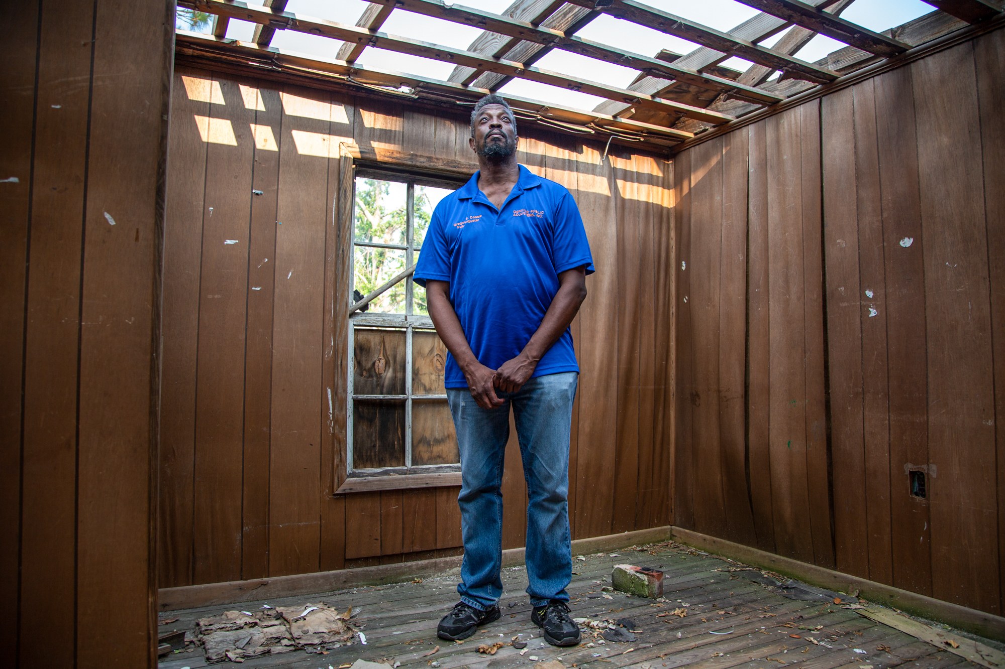 Greg Dossie - Greg Dossie of Panama City, Florida, lives next door to his childhood home, which was torn apart by Hurricane Michael. “People are thinking we’re going be back to normal in two, three, four, five years,”  Dossie said. “It’s not going to happen.” (Jake Goodrick/News21)