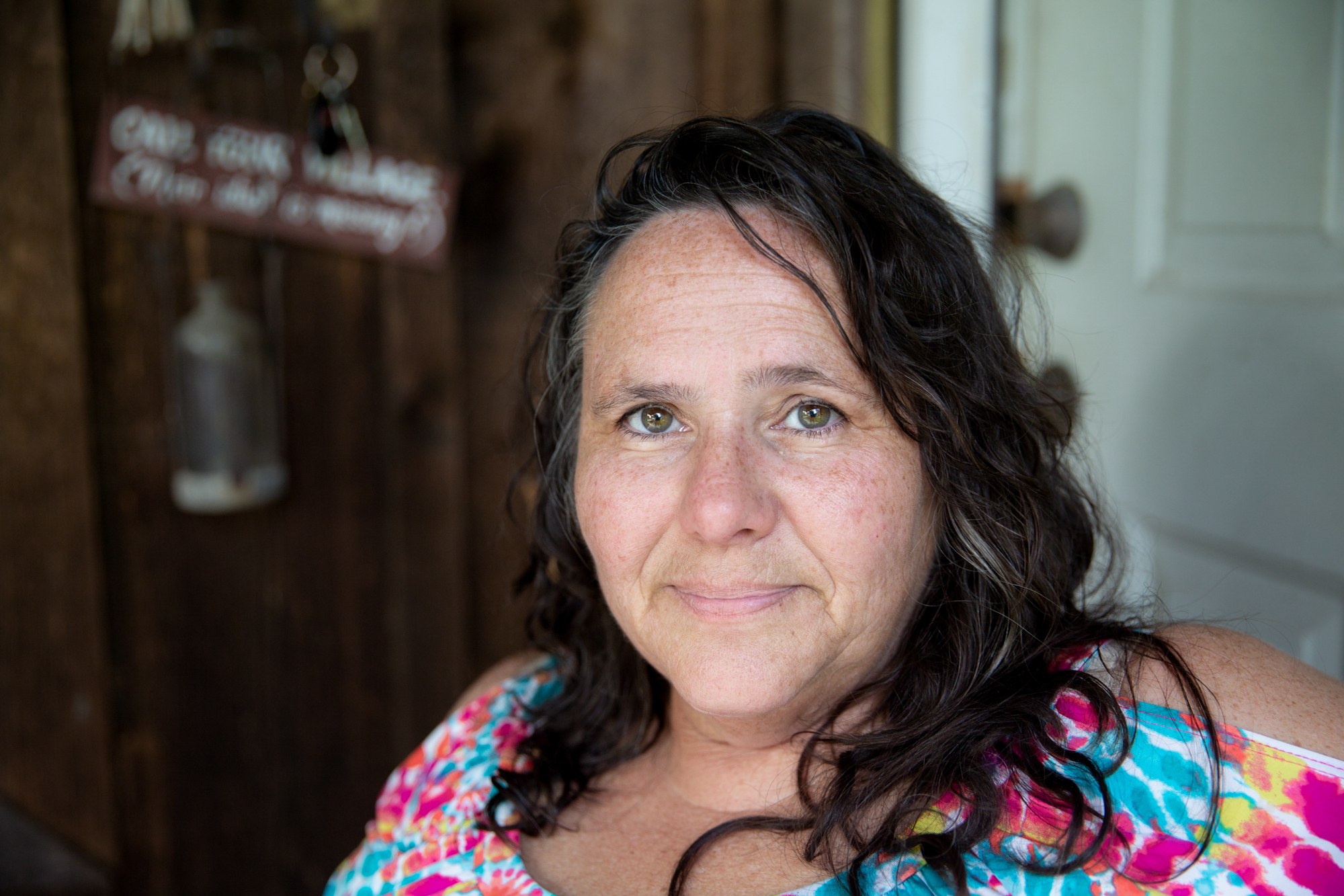 Kim Therrien - Kim Therrien has been living with a woman from her church since Hurricane Harvey left her house in Port Arthur, Texas, uninhabitable. Because she was not in a known floodplain, Therrien did not have flood insurance and has come to accept that she’ll likely never move back into the home that has been in her family for generations. (Stacy Fernández/News21)
