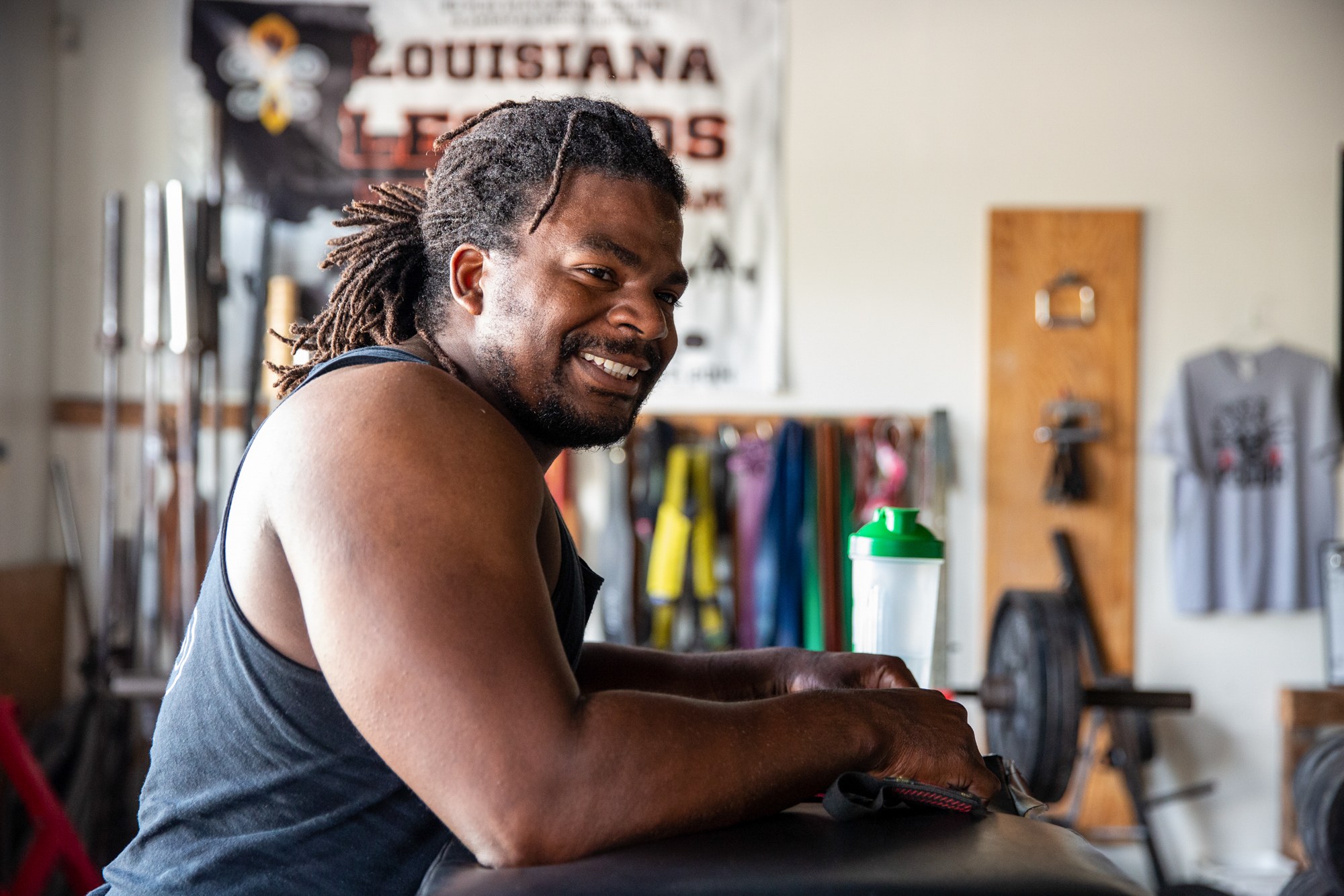Garrett “Bottesy” Bailey - Garrett “Bottesy” Bailey was 13 when he evacuated from New Orleans to Baton Rouge, Louisiana, during Hurricane Katrina. Bailey felt guilty for surviving when so many others didn’t make it out. In the years that followed, he has used powerlifting to cope with his depression. (Ellen O’Brien/News21)