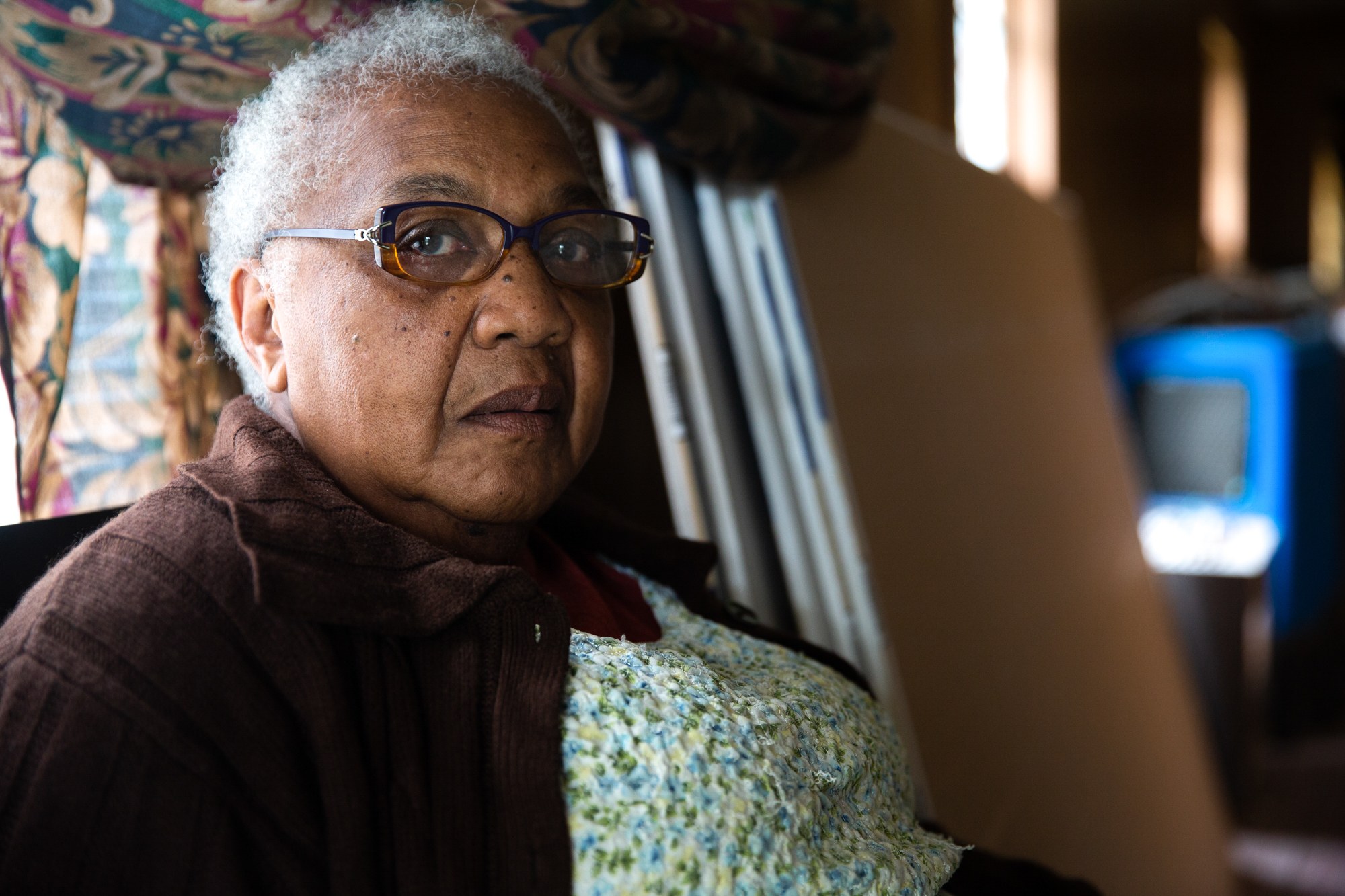 Mary Smith - Mary Smith, a lifelong resident of Dillon, South Carolina, was forced from her home after it was badly damaged by Hurricane Florence. She lives with her son in nearby Florence but every day makes the 30-mile commute just to sit in the home her father built. (Harrison Mantas/News21)