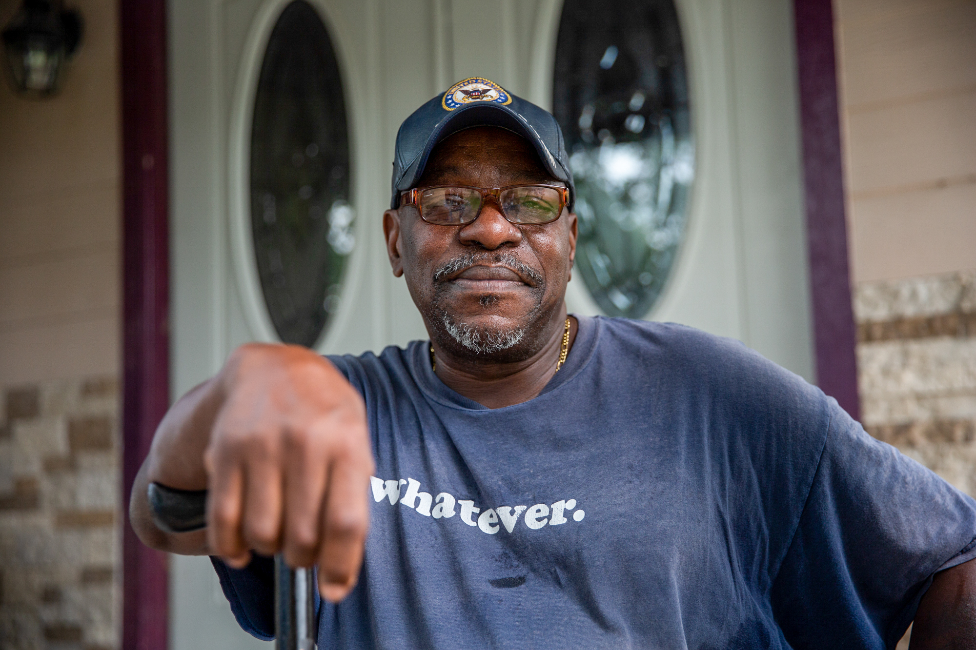 Forrester Johnson - Forrester Johnson and his wife lived in a handicap-accessible FEMA trailer for a 18 months after Hurricane Harvey. The couple moved back into their home, even though it wasn't finished, when FEMA began charging them $750 a month to stay in the trailer. Johnson now owes $1,500 he doesn't have because every penny has gone into rebuilding the house. (Stacy Fernández/News21)
