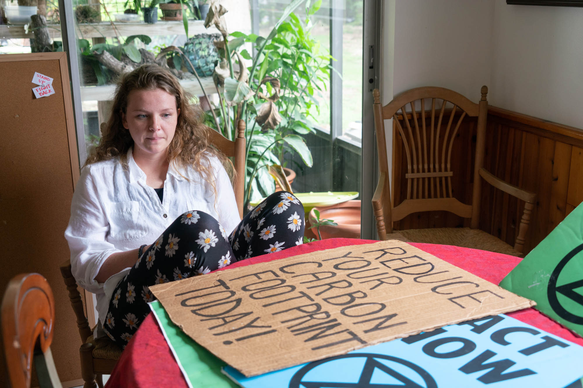 Rachel Collins of Homestead, Florida, has been passionate about climate change for years. But the 21-year-old activist realizes her first protest sign was somewhat naive. The difference individuals can make is minuscule compared to what governments and corporations can do, she said. (Jordan Laird/News21)
