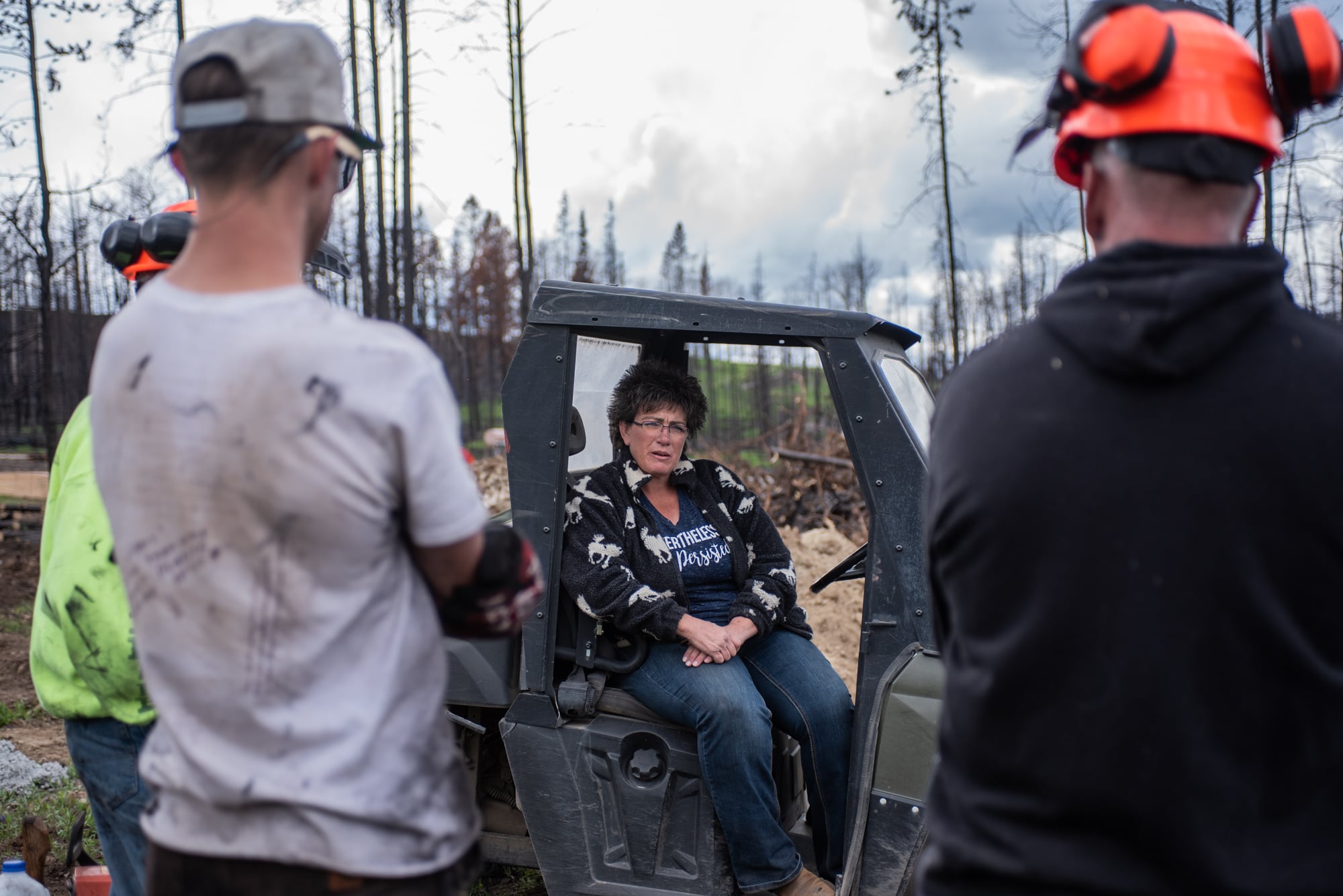 In the months after the Roosevelt Fire roared through Sublette County  last September, Andrea “Andie” Sramek of Hoback Ranches has organized multiple countywide cleanups to help cut down trees and sift through rubble from the fire, which destroyed 55 homes. (Dustin Patar/News21)